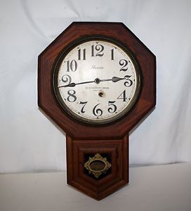Antique Ansonia Wall Clock with Pendulum Key for Montgomery Bros Jewelers