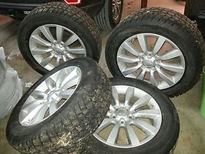 Snow Tires and Rims Set of 4 Barely Used