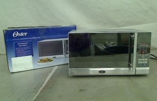 Oster 0.7 Cubic Feet Microwave Oven 700 Watts OGT6701