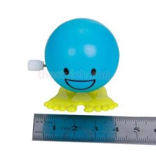 Wind Up Toy Clockwork Jump Jumping Face Smile Teeth Kids Party Favour Fun Gift
