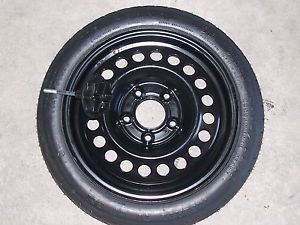 98 Buick LeSabre Compact Donut Spare Tire Rim Wheel w Nut Pontiac Chevrolet GM